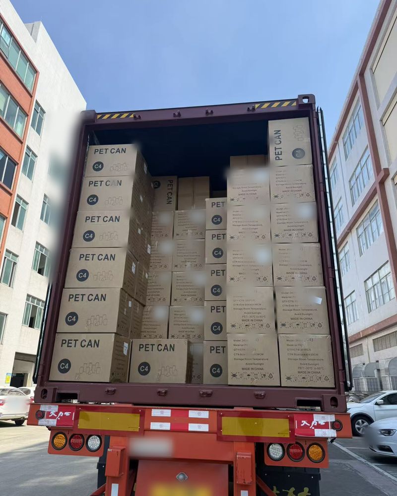 Container loaded with PET can cartons