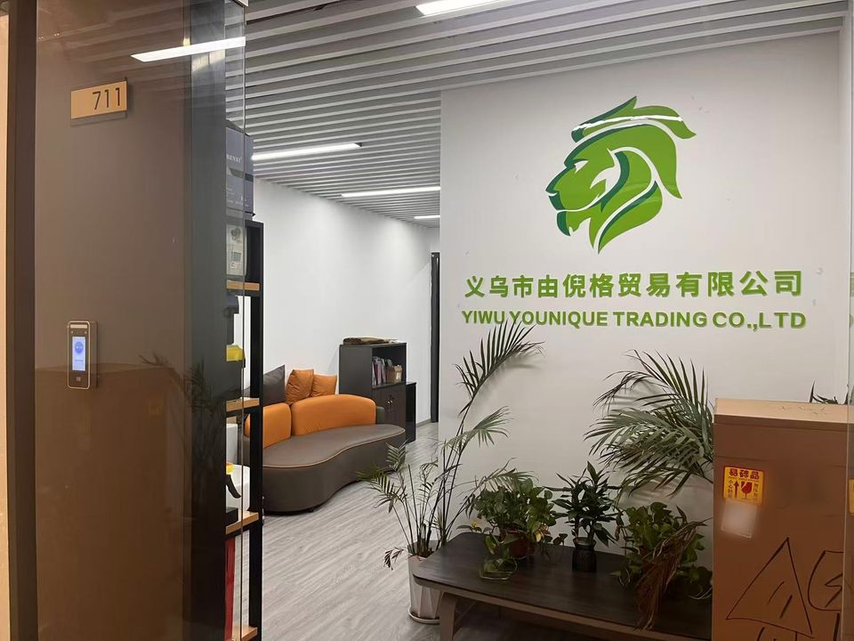 Yiwu Younique reception with the lion logo wall